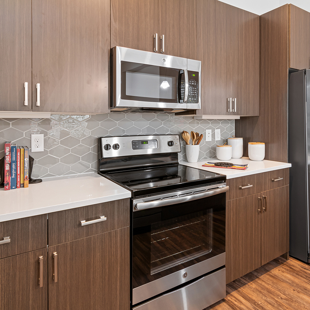 Creekside at Crabtree - Kitchen with Stylish Wood Cabinets