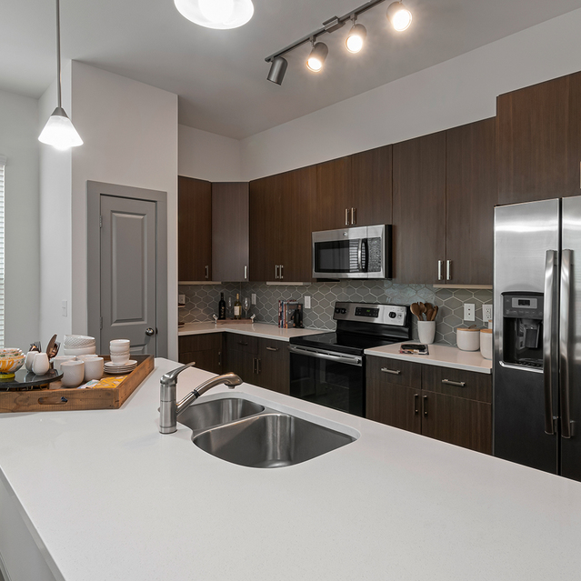 Creekside at Crabtree - Kitchen with Island and Modern Appliances