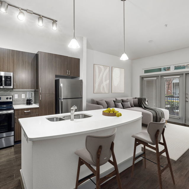 Creekside at Crabtree - Apartment Kitchen with Island Near the Entrance