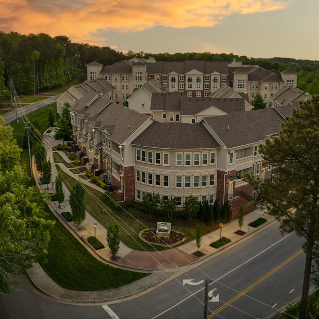Creekside at Crabtree - Aerial View of Apartments at Dusk